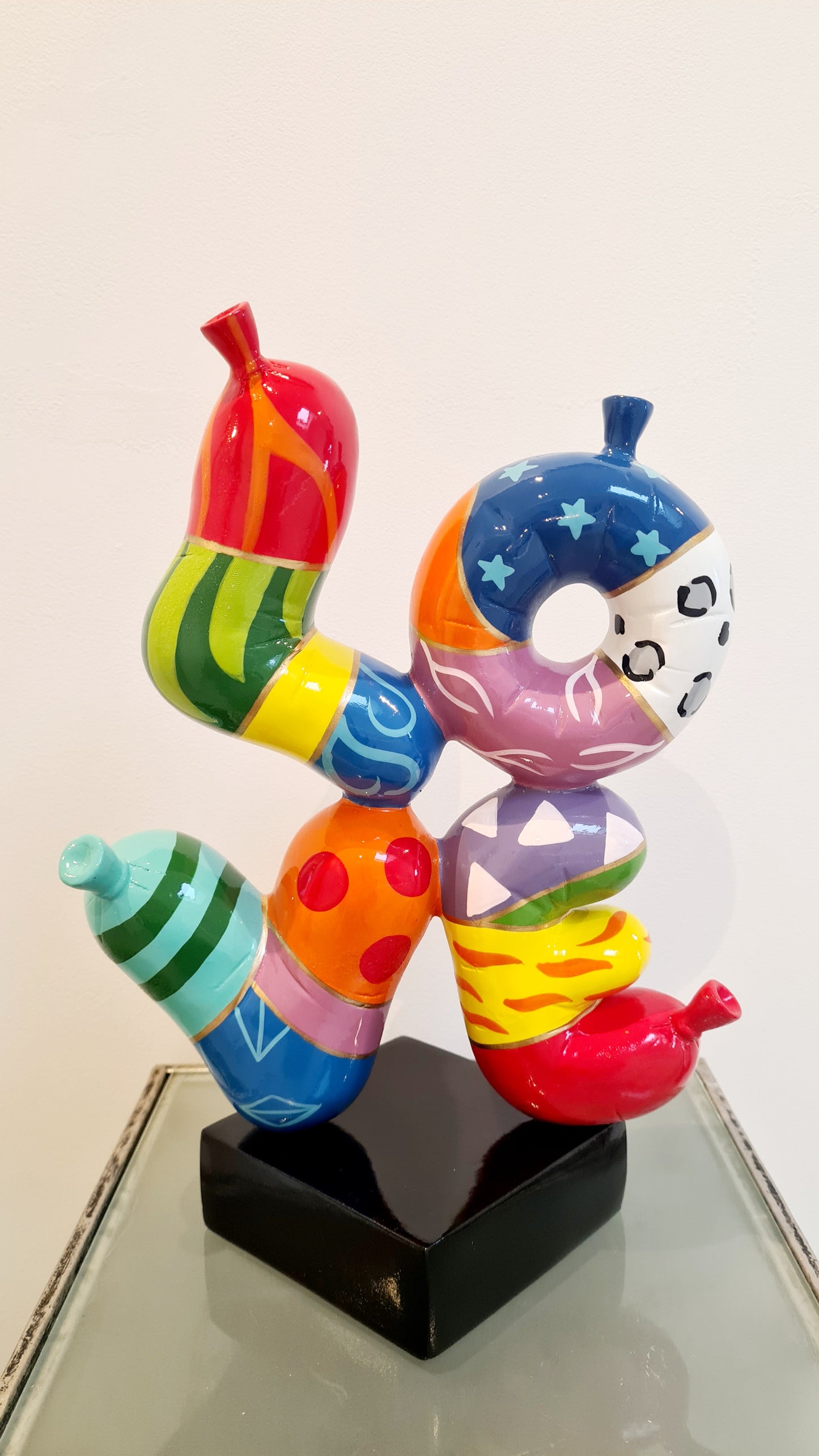 Love balloon sculpture in multicolored resin, height 14'1 inches (36 centimeters)