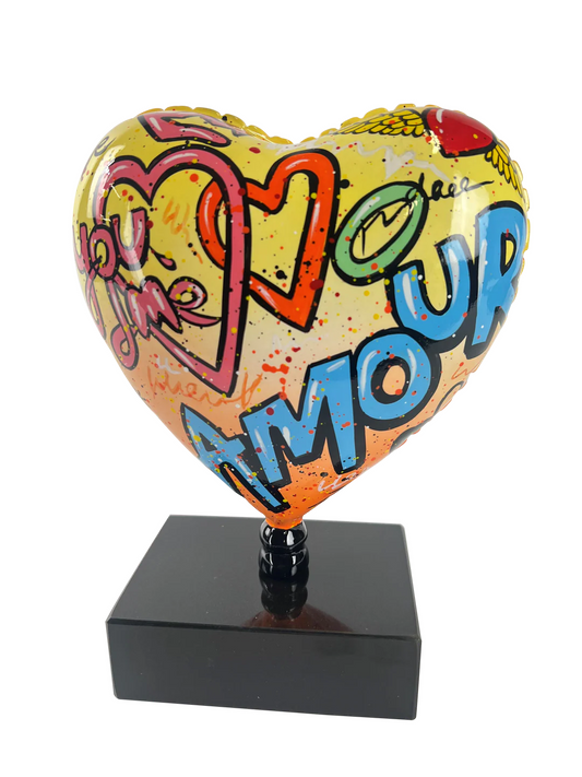 "Love" Heart sculpture or statue in multi-colored resin. Height 25 and width 18 centimeters