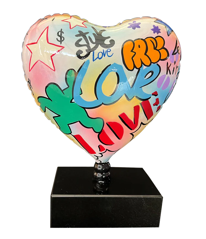 "Love" Heart sculpture or statue in multi-colored resin. Height 25 and width 18 centimeters