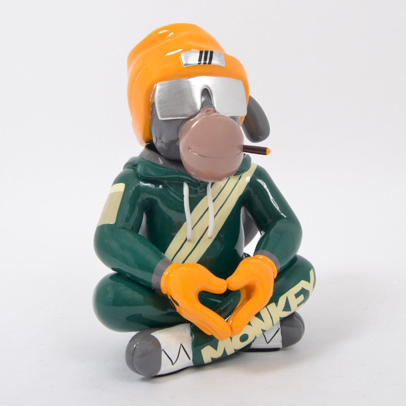 Skiing monkey statue, in multicolored resin, height 36 centimeters