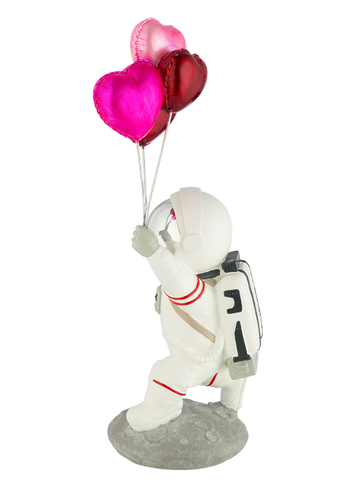 Resin astronaut statue or figurine with heart balloons. Height 39 cm