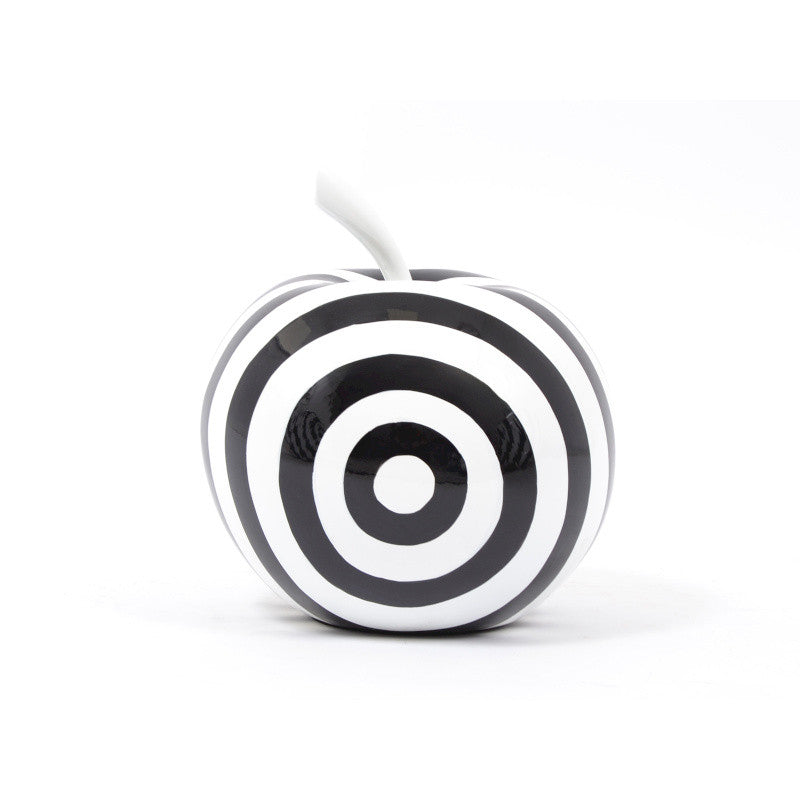 Fruit sculpture. Black and white striped resin apple. Height 26 centimeters