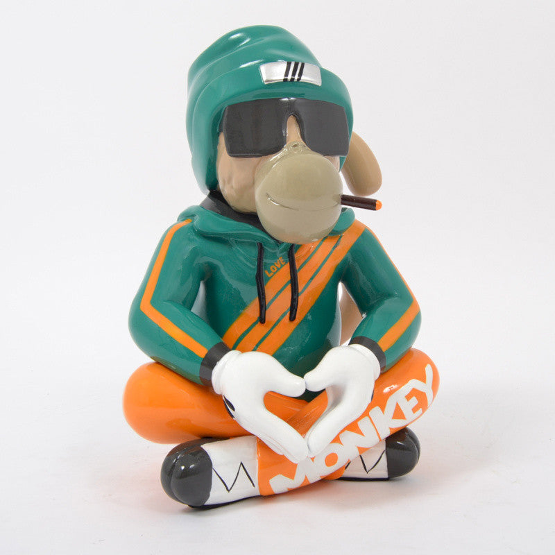 Skiing monkey statue, in multicolored resin, height 36 centimeters