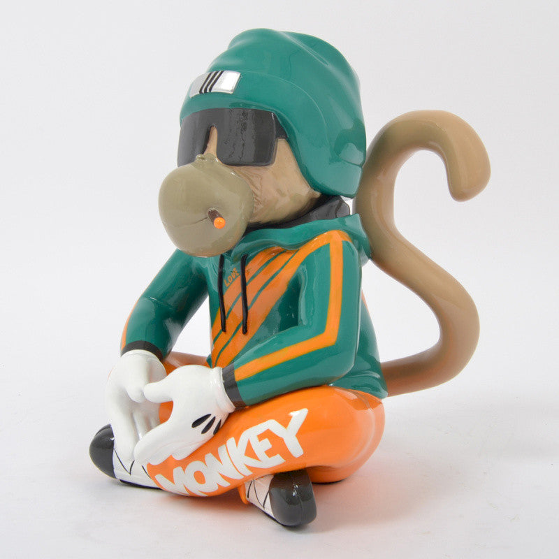 Skiing monkey statue, in multicolored resin, height 36 centimeters