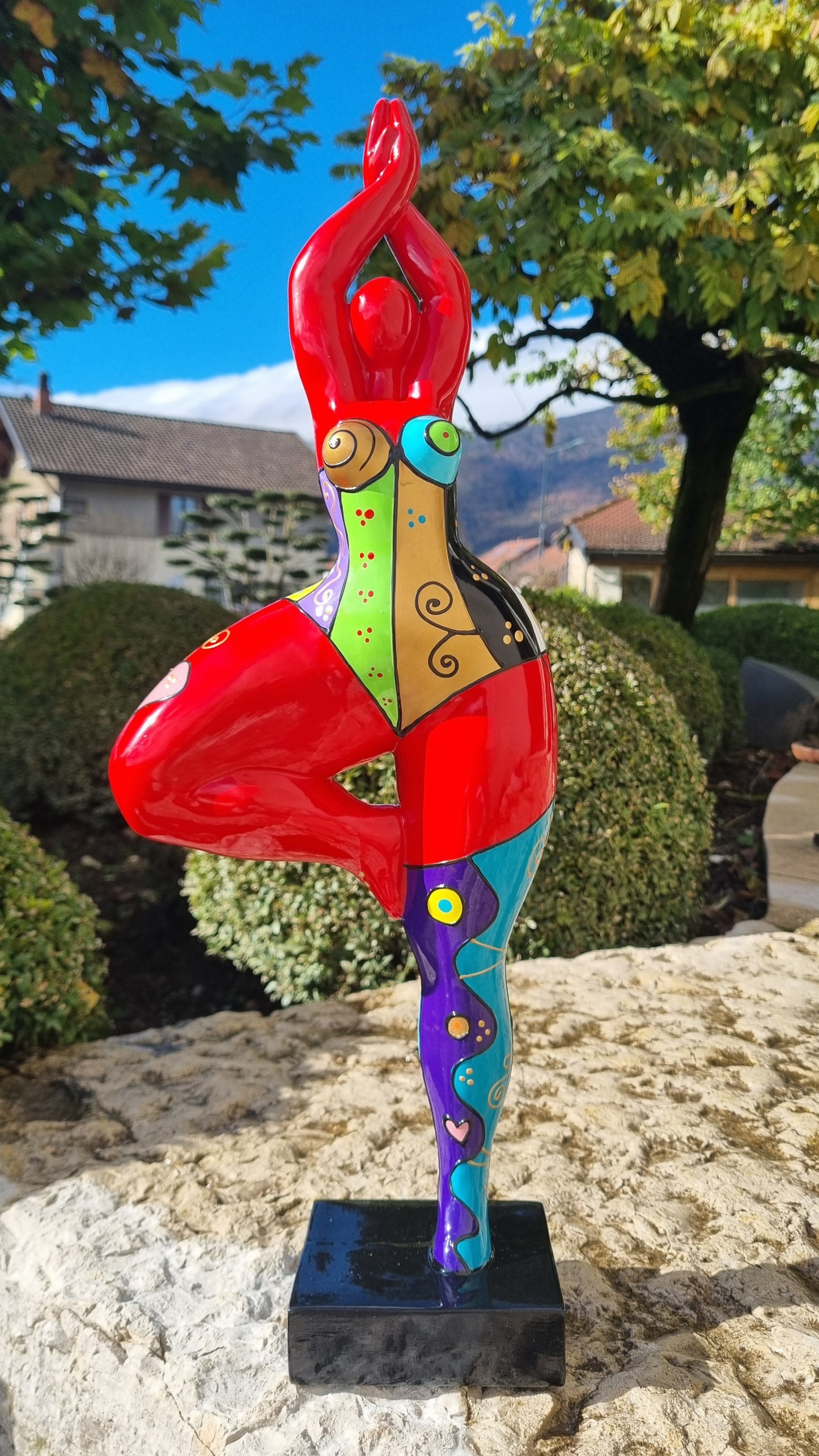Statue of a dancing woman, in multicolored resin, height 52 centimeters