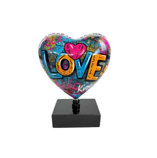 "Love" Heart sculpture or statue in multi-colored resin. Height 25 and width 18 centimeters