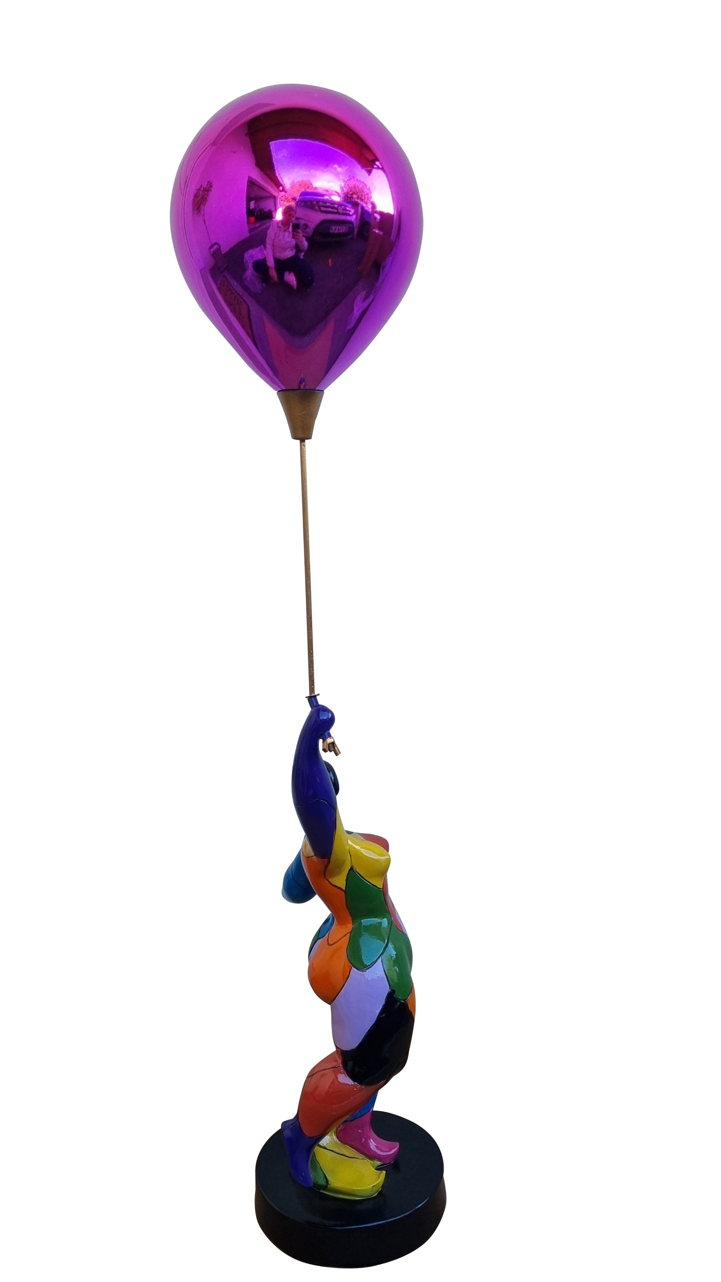 Round, multi-colored statue of a woman with a ball, Nana style, made of resin. Total height 76 centimeters