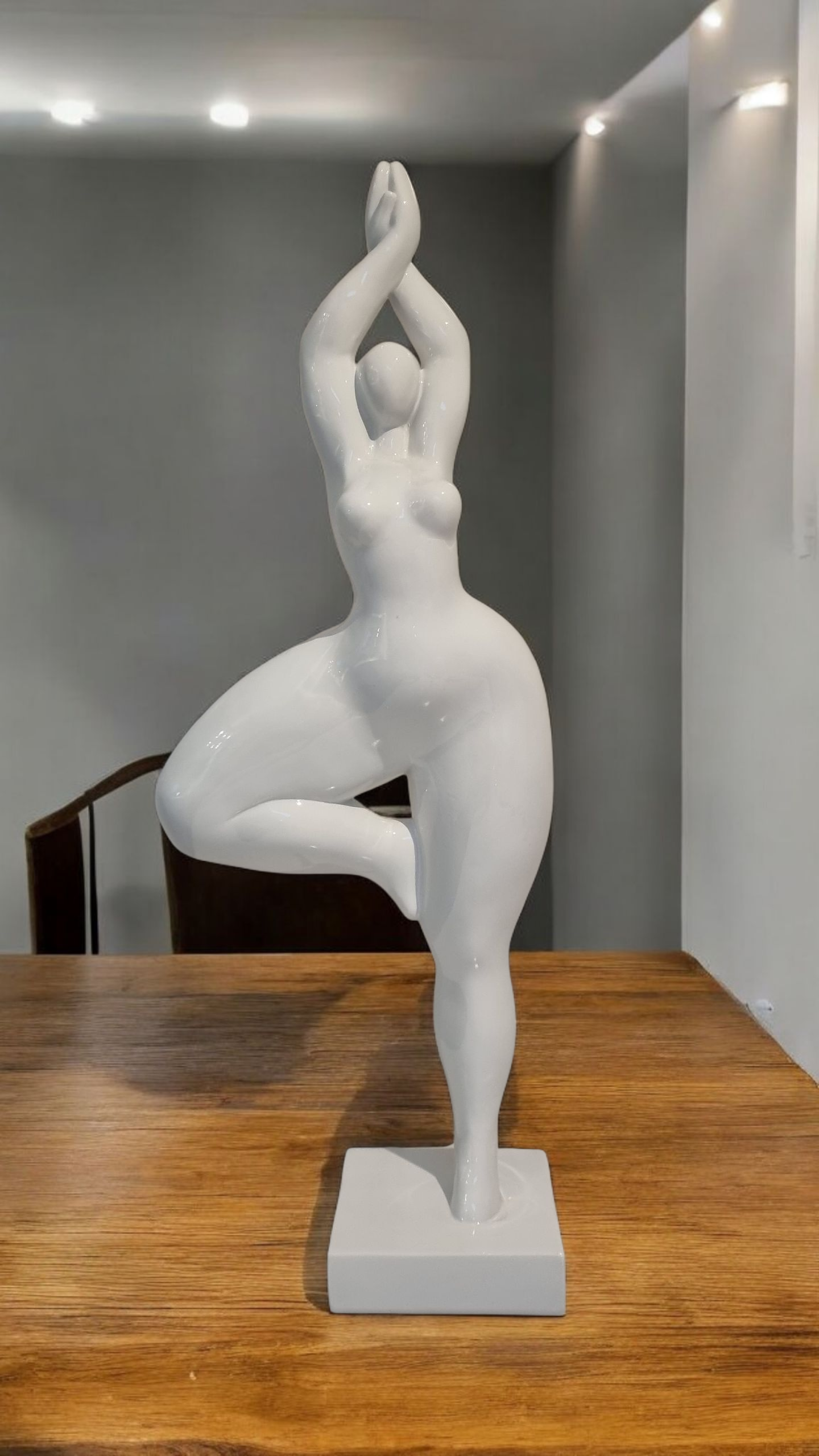 Sculpture of a round & curvy woman, resin colorful. Height 52 centimeters