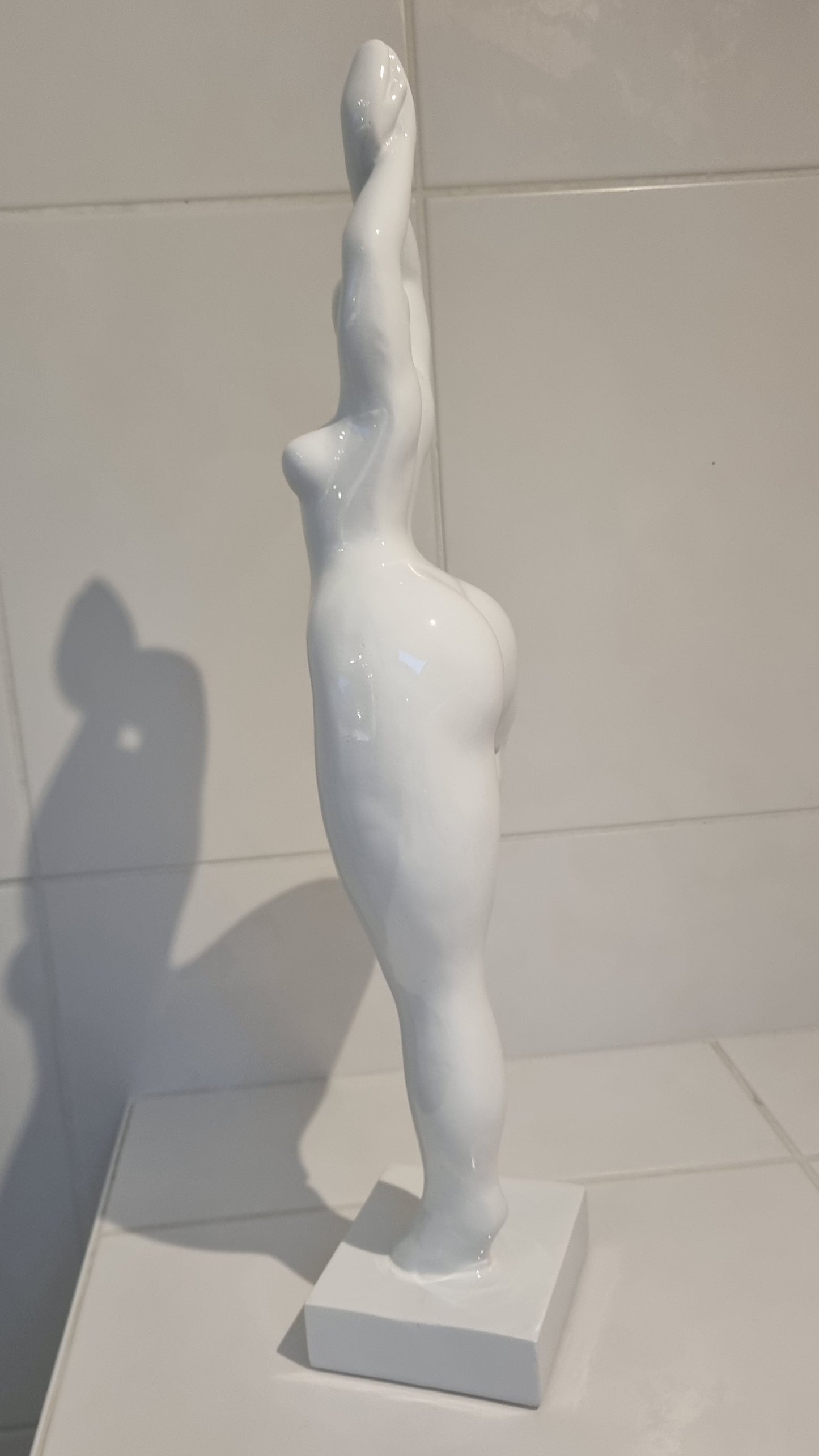 Sculpture of a round & curvy woman, resin colorful. Height 52 centimeters