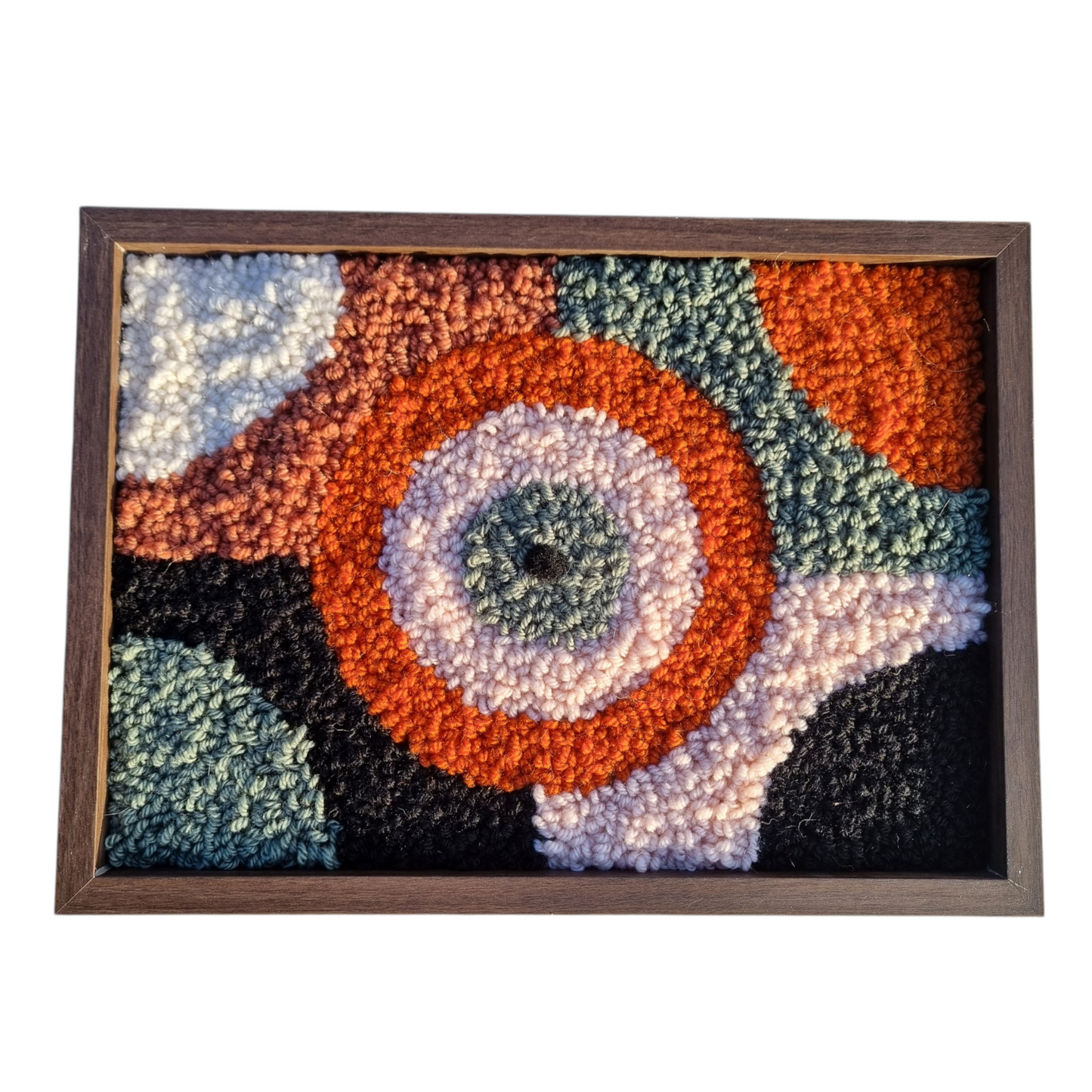 Wall hanging made with punch needle or tufting wool, warm tones of beige, brown, and orange. One-of-a-kind piece, 23 × 31 cm