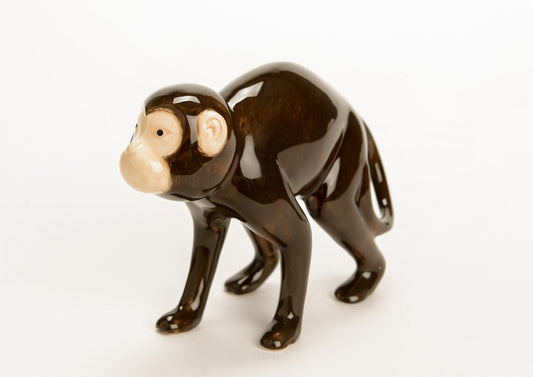 Monkey statue, ceramic, hand painted. Height 4 inches (10 centimeters)
