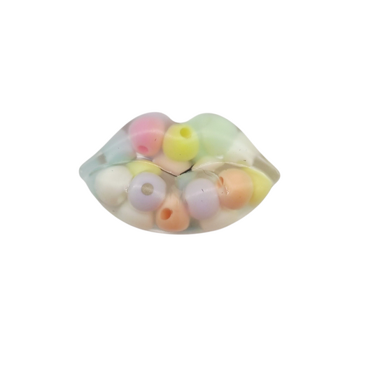 Petit magnet bouche en résine, transparent avec perles pastels, longueur 3,5 cm