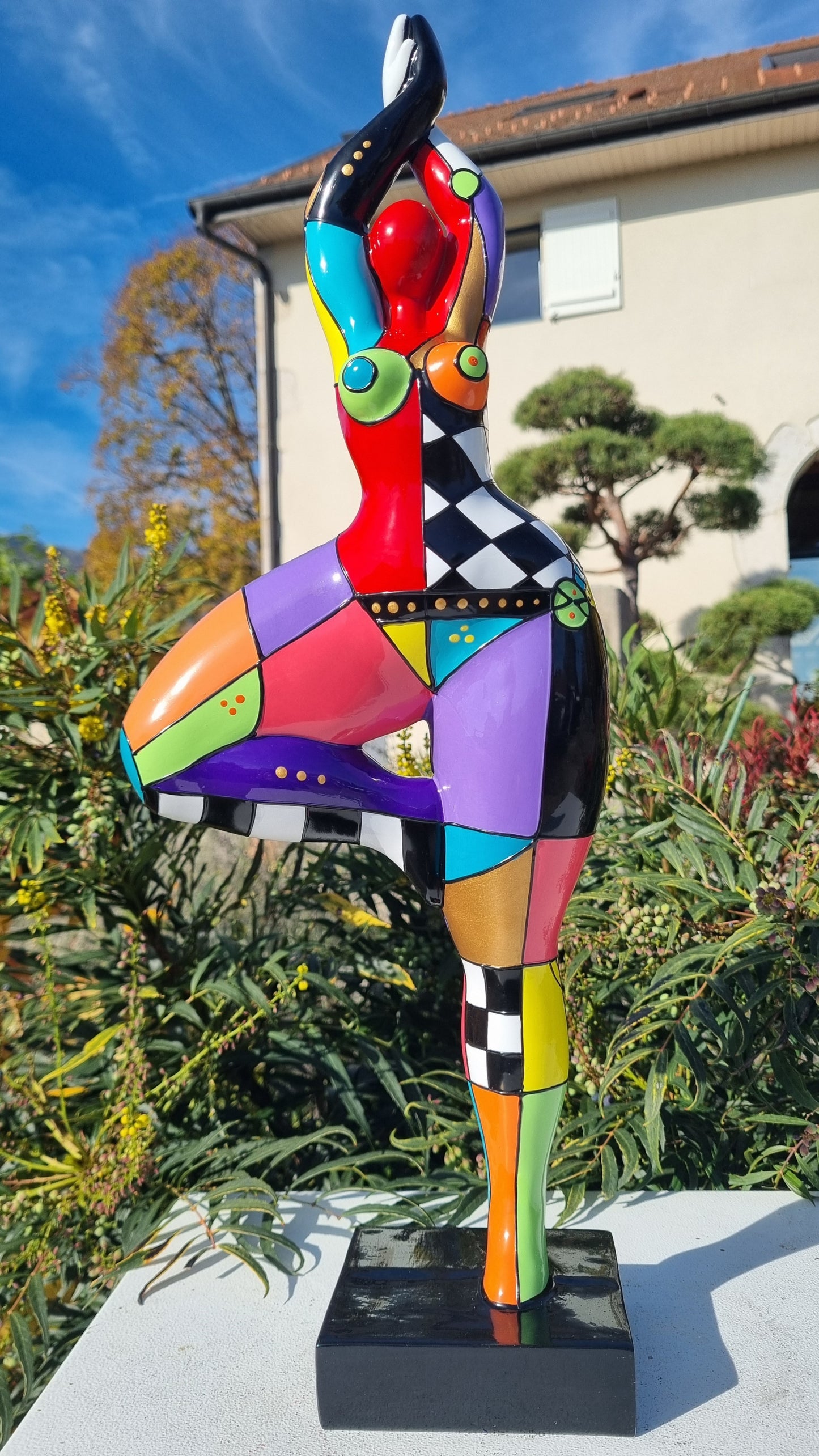 Statue of a dancing woman, in multicolored resin, height 52 centimeters