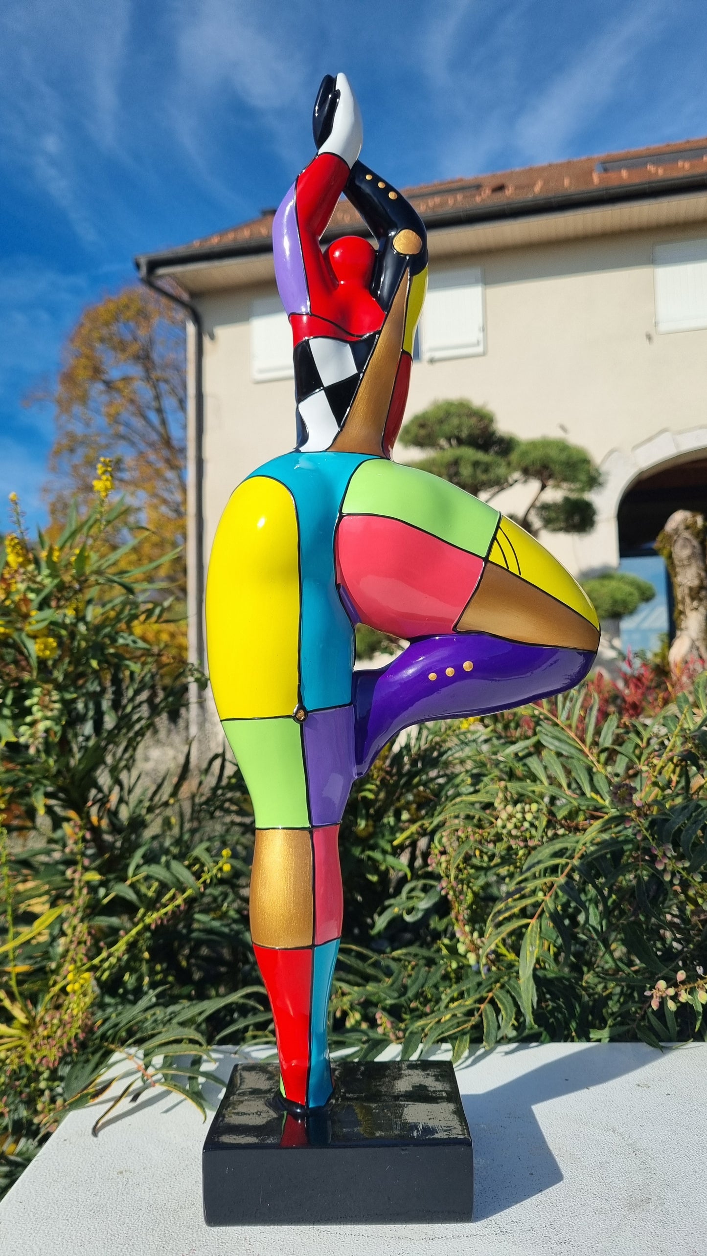 Statue of a dancing woman, in multicolored resin, height 52 centimeters