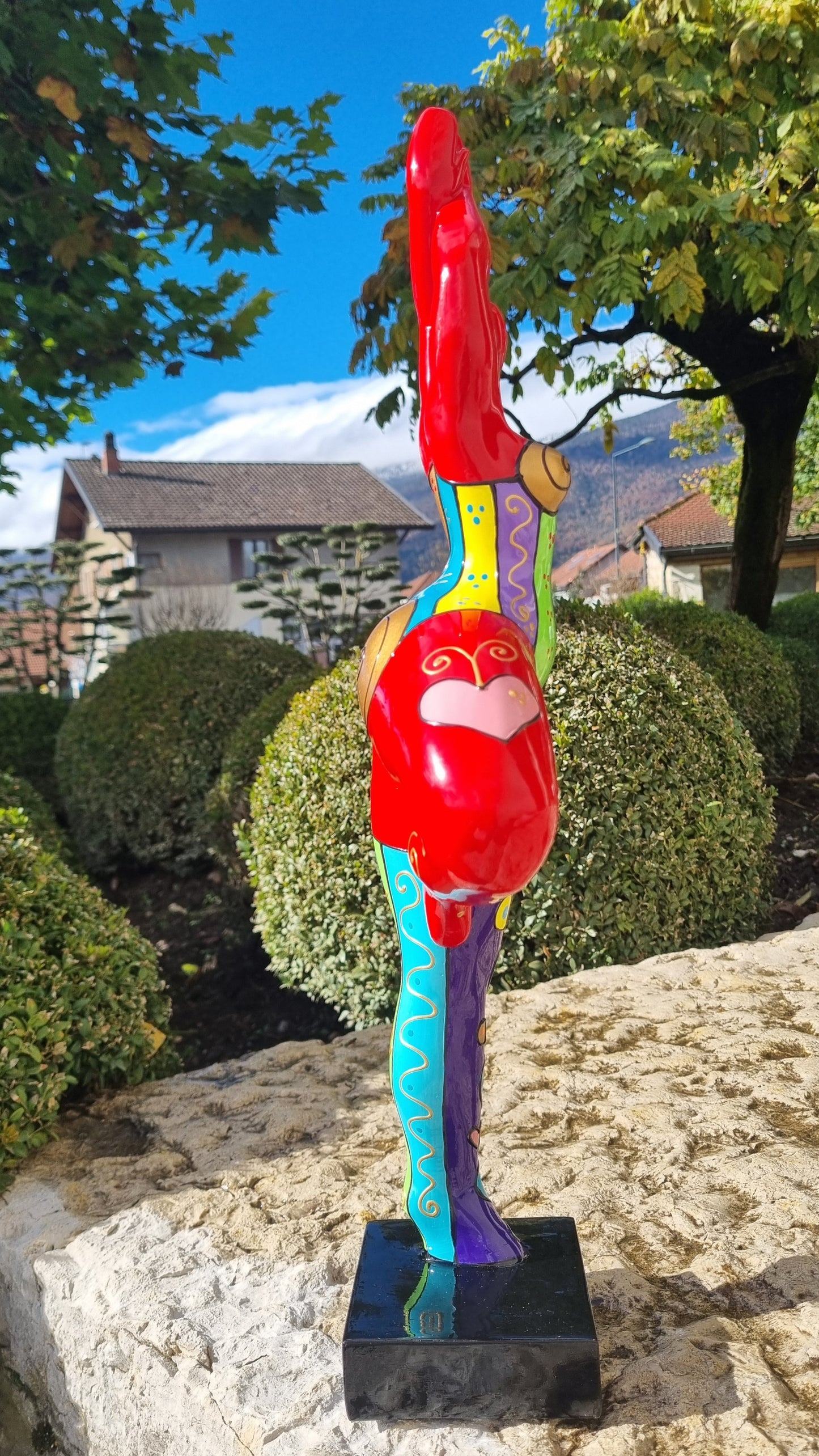 Statue of a dancing woman, in multicolored resin, height 52 centimeters