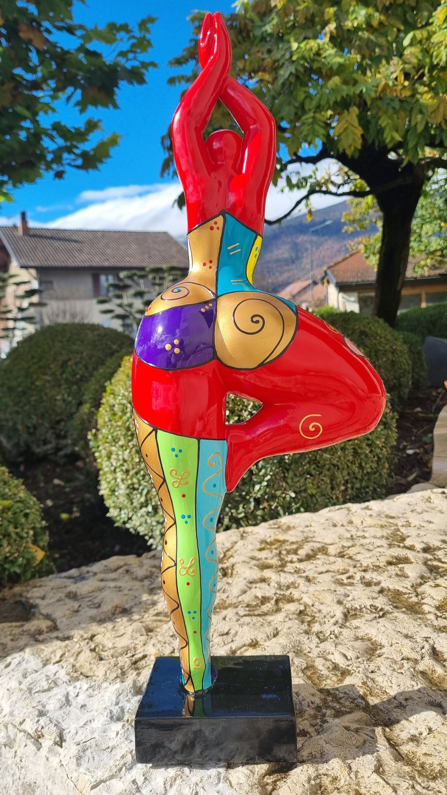 Statue of a dancing woman, in multicolored resin, height 52 centimeters