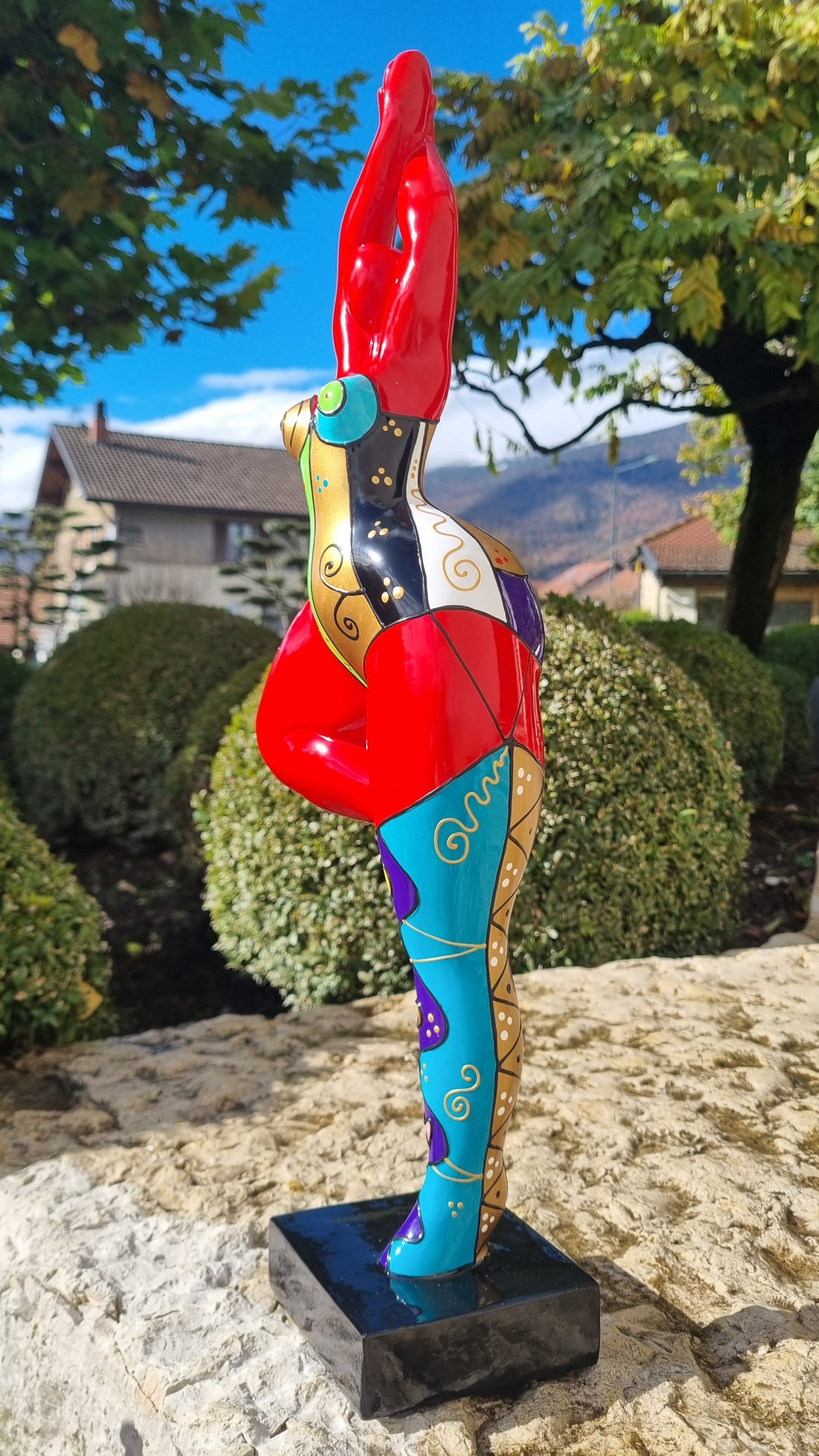 Statue of a dancing woman, in multicolored resin, height 52 centimeters