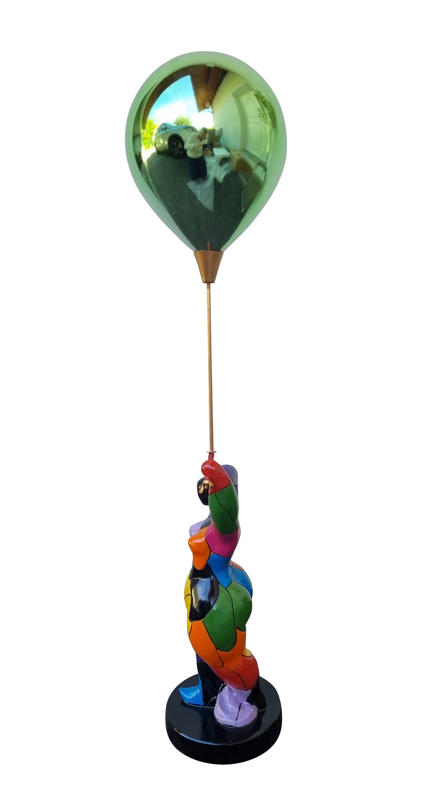 Round, multi-colored statue of a woman with a ball, made of resin. Total height 76 centimeters