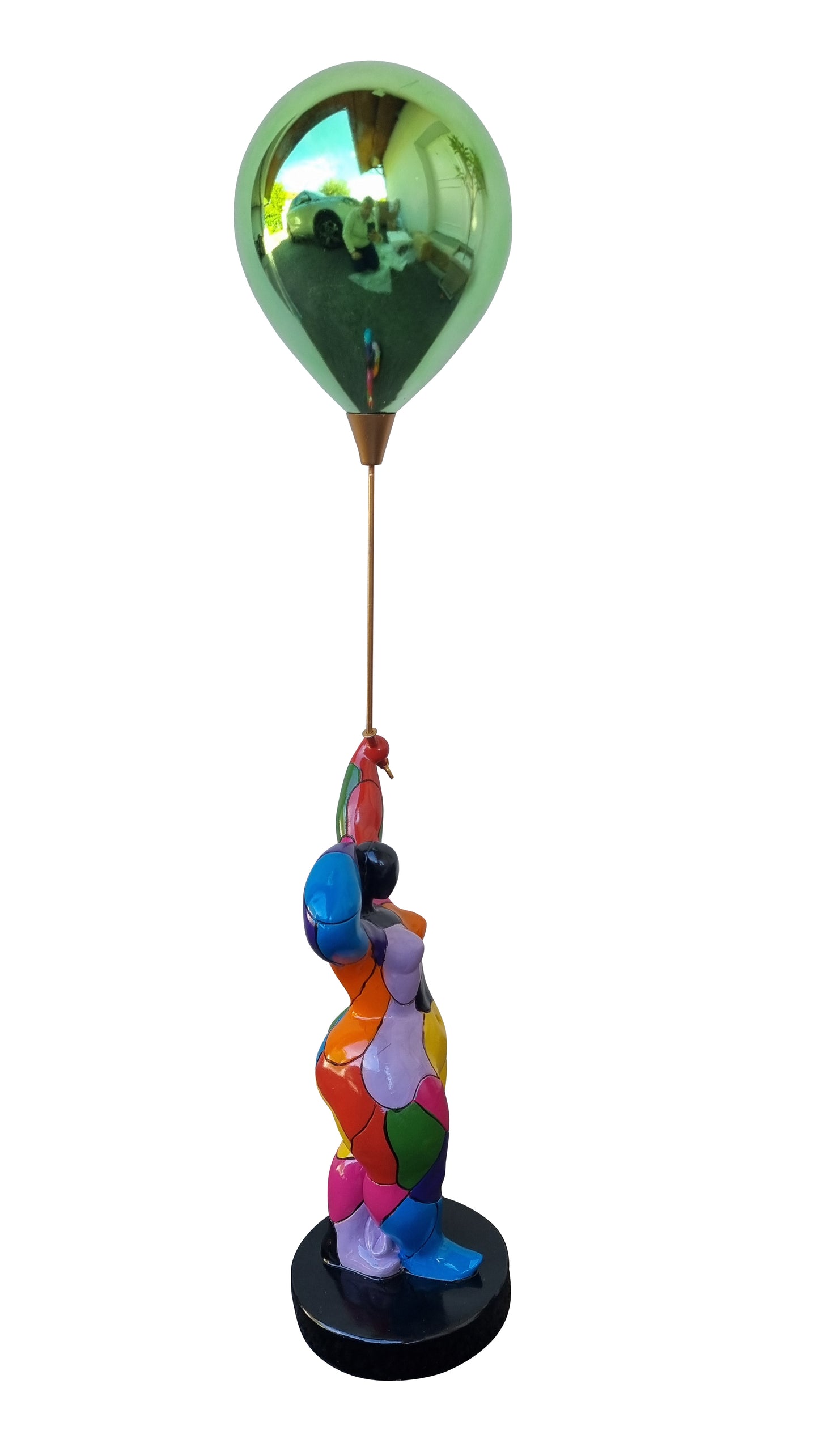 Round, multi-colored statue of a woman with a ball, made of resin. Total height 76 centimeters